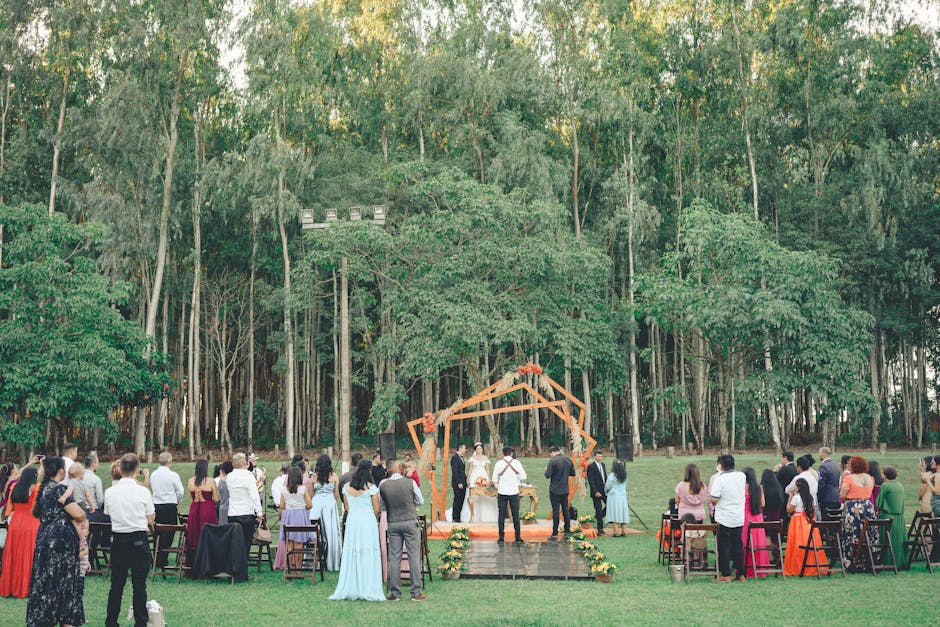 Beautiful outdoor wedding ceremony setup with floral arrangements
